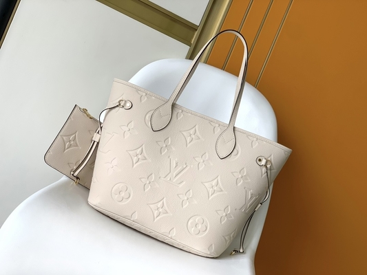 Preloved a stigmatisé la toile Neverfull millimètre Tote Bag beige de monogramme