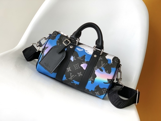 L'éclipse de monogramme de lever de soleil a stigmatisé la pièce de Bag BT Keepall Bandoulière 25 de messager avec une vue
