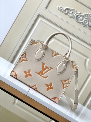 Monogramme géant OnTheGo millimètre Louis Vuitton Messenger Bag For Ipad Mini de safran crème