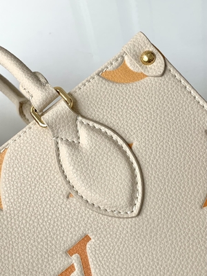 Monogramme géant OnTheGo millimètre Louis Vuitton Messenger Bag For Ipad Mini de safran crème