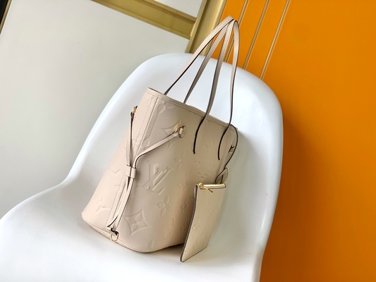 Preloved a stigmatisé la toile Neverfull millimètre Tote Bag beige de monogramme