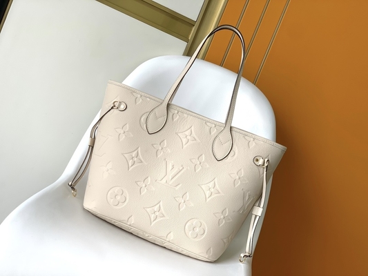 Preloved a stigmatisé la toile Neverfull millimètre Tote Bag beige de monogramme