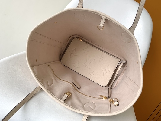 Preloved a stigmatisé la toile Neverfull millimètre Tote Bag beige de monogramme