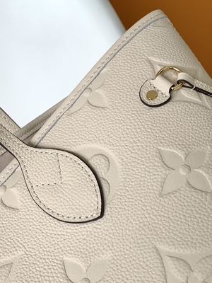 Preloved a stigmatisé la toile Neverfull millimètre Tote Bag beige de monogramme