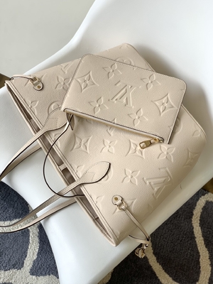 Preloved a stigmatisé la toile Neverfull millimètre Tote Bag beige de monogramme