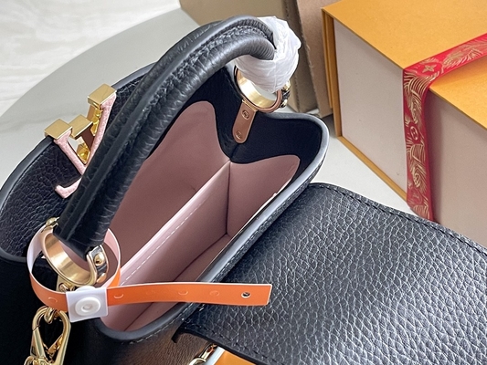 La peau de chèvre rayant Preloved a stigmatisé le sac Louis Vuitton Capucines Mini
