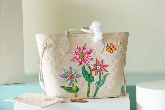La partie a stigmatisé des dames monogramme Empreinte de Neverfull millimètre de sac à main avec la marqueterie de fleur