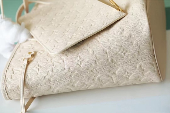La partie a stigmatisé des dames monogramme Empreinte de Neverfull millimètre de sac à main avec la marqueterie de fleur