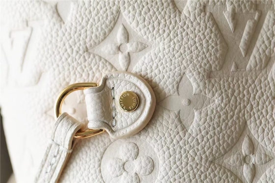 La partie a stigmatisé des dames monogramme Empreinte de Neverfull millimètre de sac à main avec la marqueterie de fleur