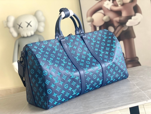 Sacs bleus de Keepall BANDOULIÈRE 50 Boston du sac des grands hommes marqués