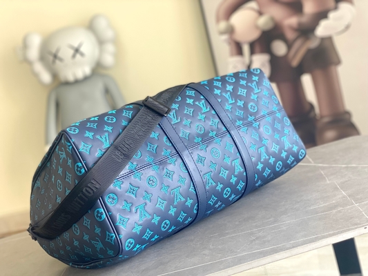 Sacs bleus de Keepall BANDOULIÈRE 50 Boston du sac des grands hommes marqués