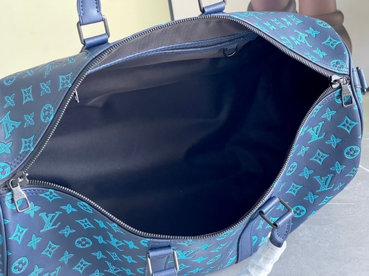 Sacs bleus de Keepall BANDOULIÈRE 50 Boston du sac des grands hommes marqués